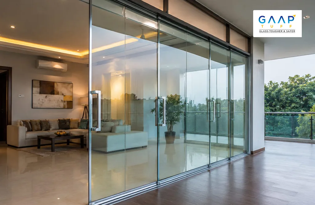 Modern Residential Interior with Large Glass Sliding Doors and Premium Processed Glass Used in Contemporary Construction Design